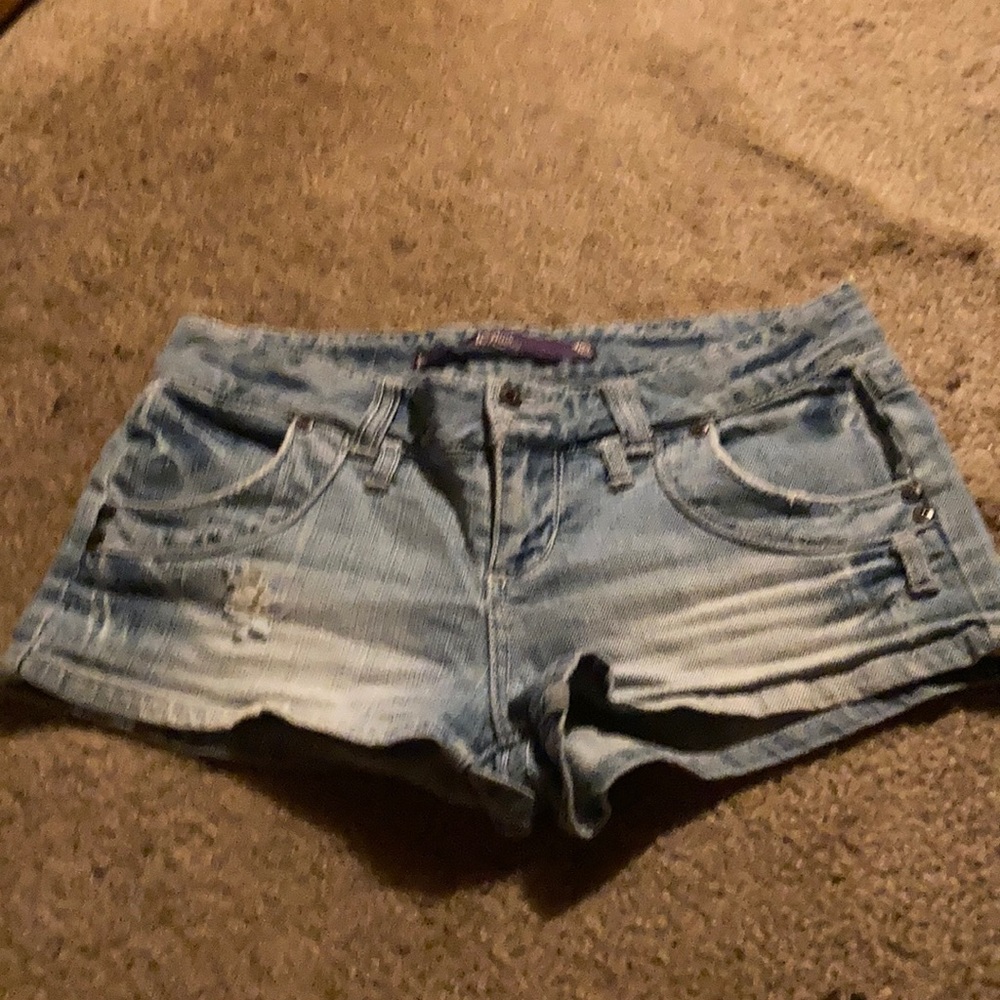 Pink distressed jean shorts